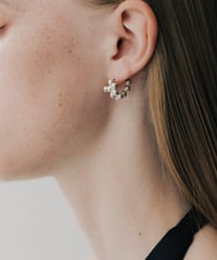 Modeling Orb hoop pierce haif silver