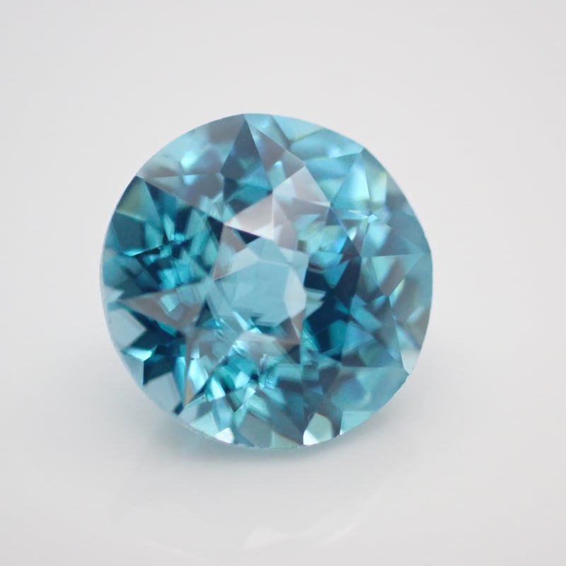 ブルー ジルコン 3.24ct 8mm カメリア カット ルース シミズ貴石