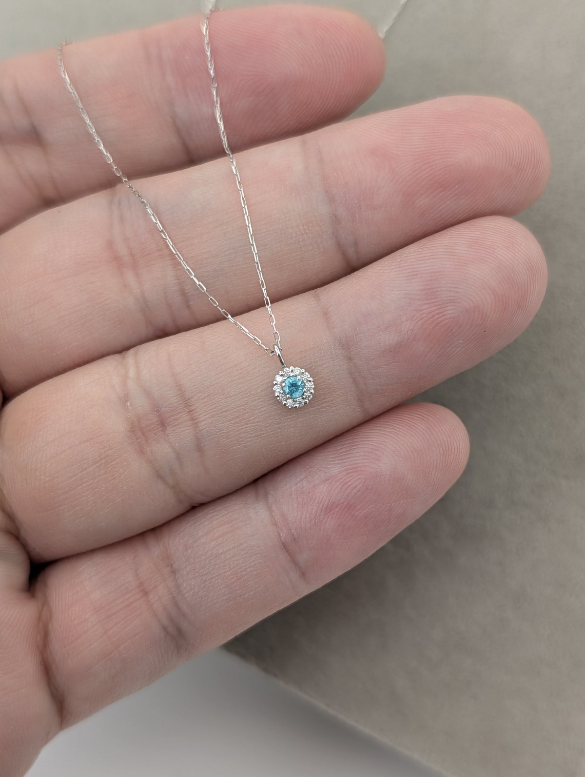 PT パライバトルマリン 0.04ct D0.03ct 40cm ラウンドヘイロー