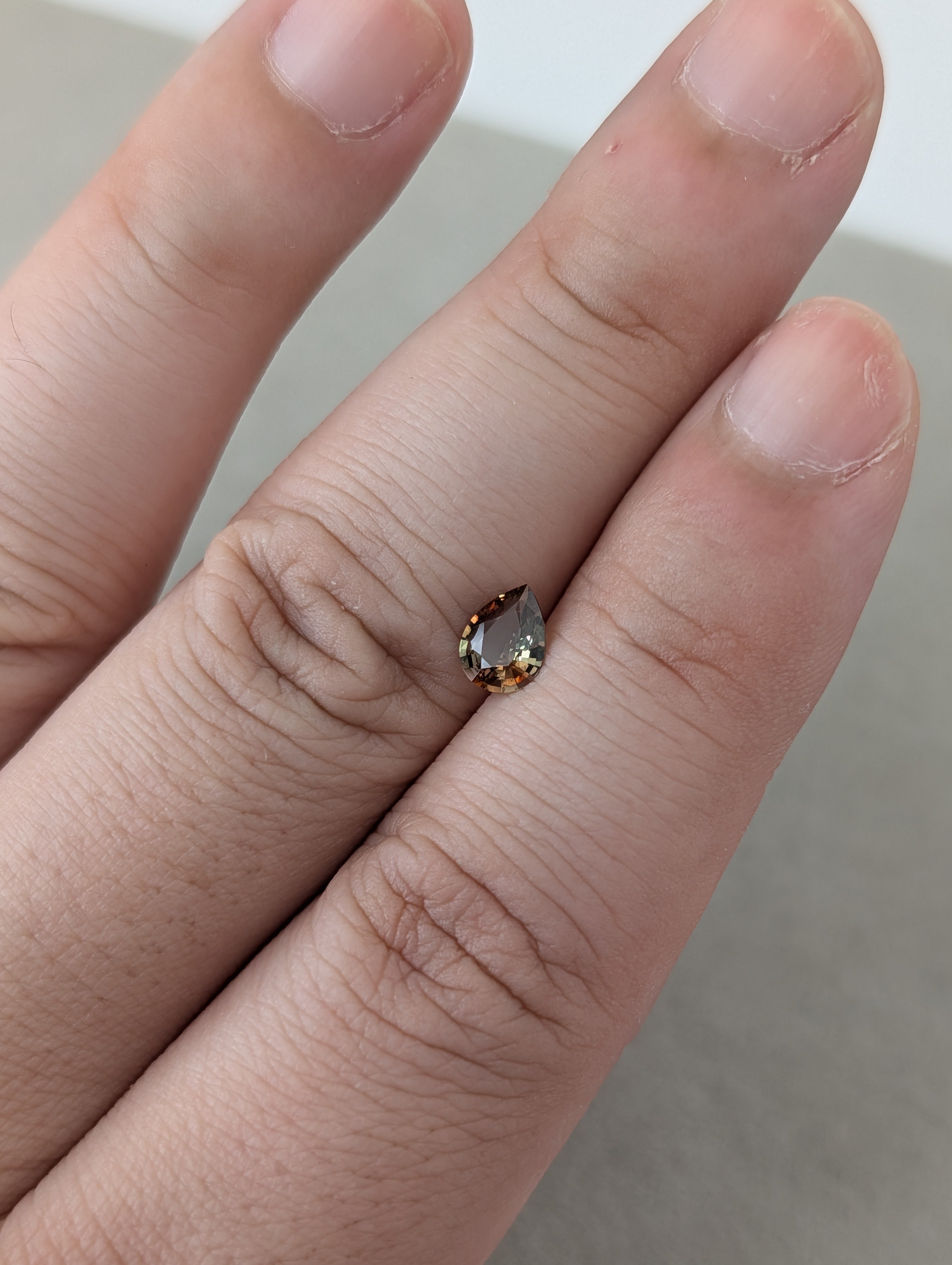 アンダリュサイト 0.52ct 6.65×5.06㎜ ペアシェイプ ルース | 鈴木屋