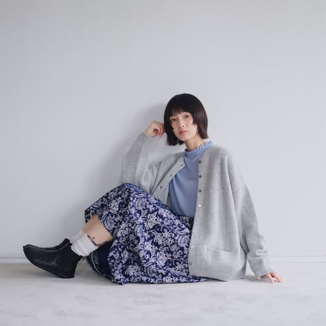 ケーブル編みカーディガン