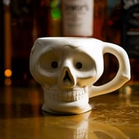 ATTRACTIONS SKULL MUG WHITE