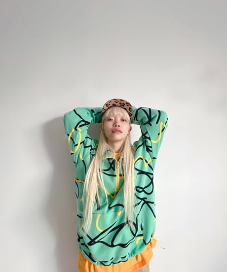 ALL-OVER PATTERED HALF ZIP SWEATSHIRT