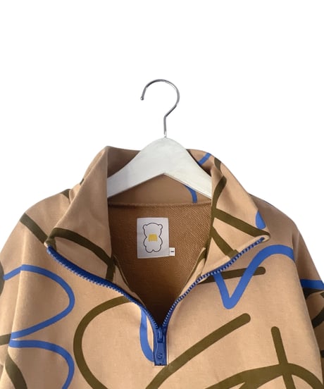 ALL-OVER PATTERED HALF ZIP SWEATSHIRT