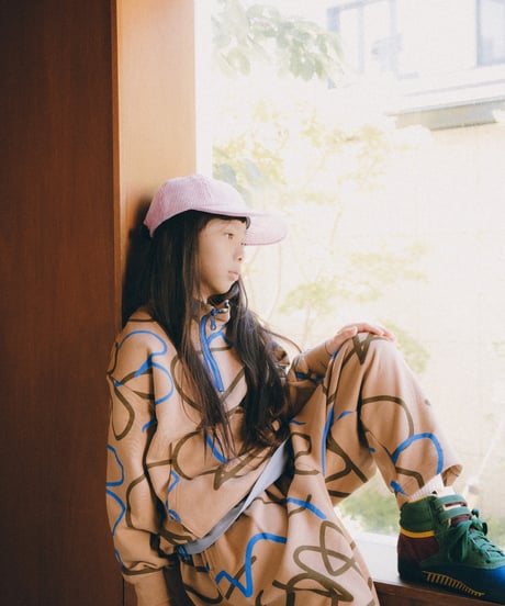 ALL-OVER PATTERED HALF ZIP SWEATSHIRT