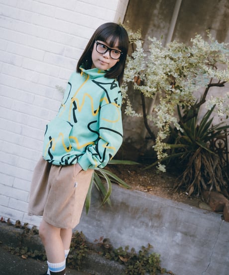 ALL-OVER PATTERED HALF ZIP SWEATSHIRT