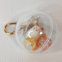 もちにゃのカプセルストラップ(オレンジ)