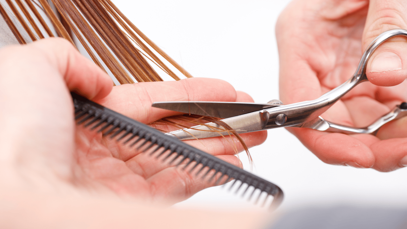 Woman getting her hair cut