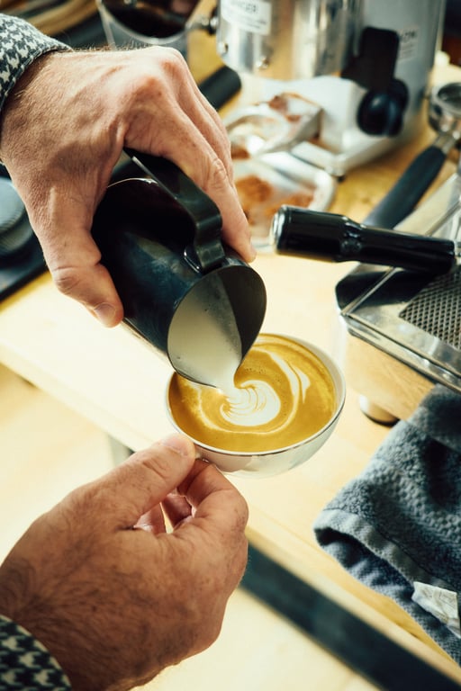 Tony pulling a shot of espresso at his coffee machine