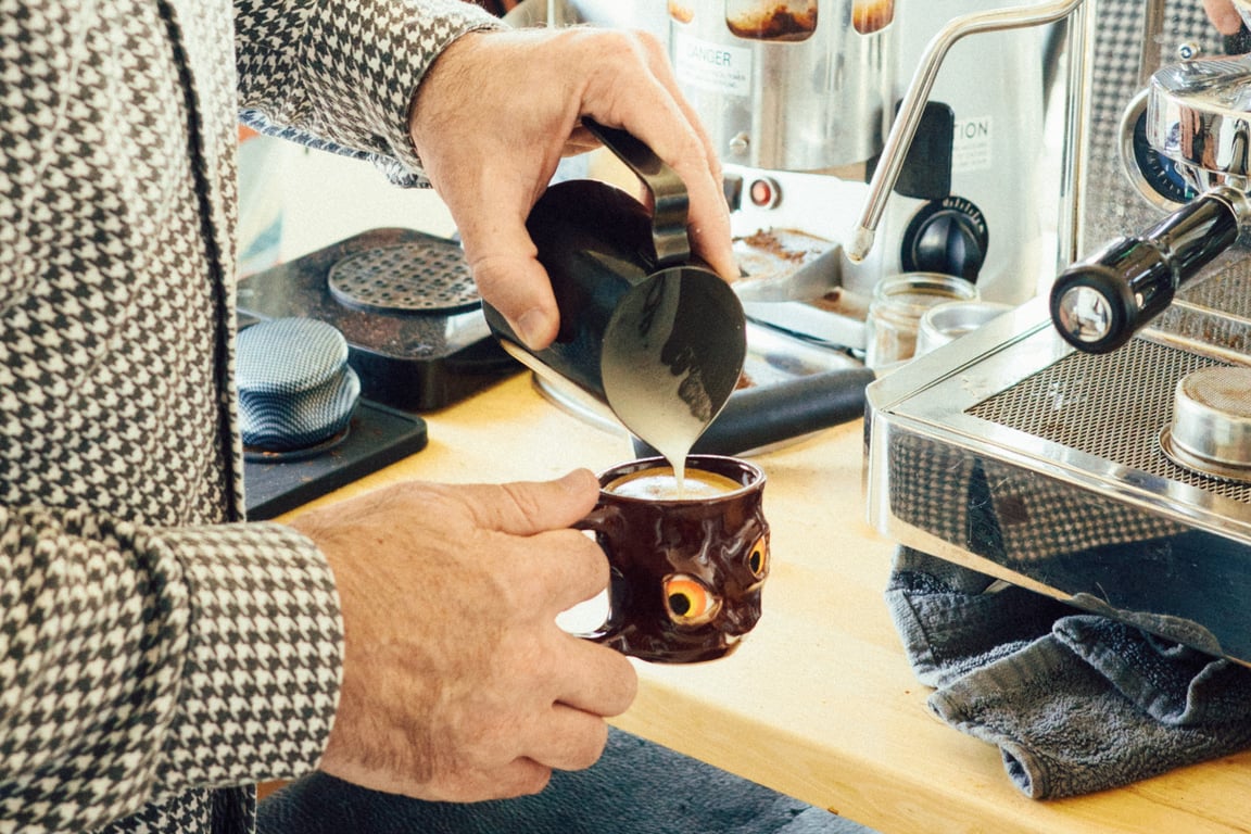 Tony pulling a shot of espresso at his coffee machine