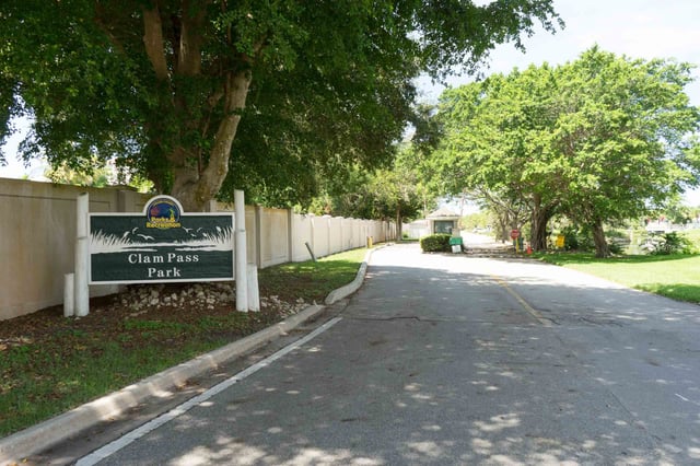 Clam pass entrance sign