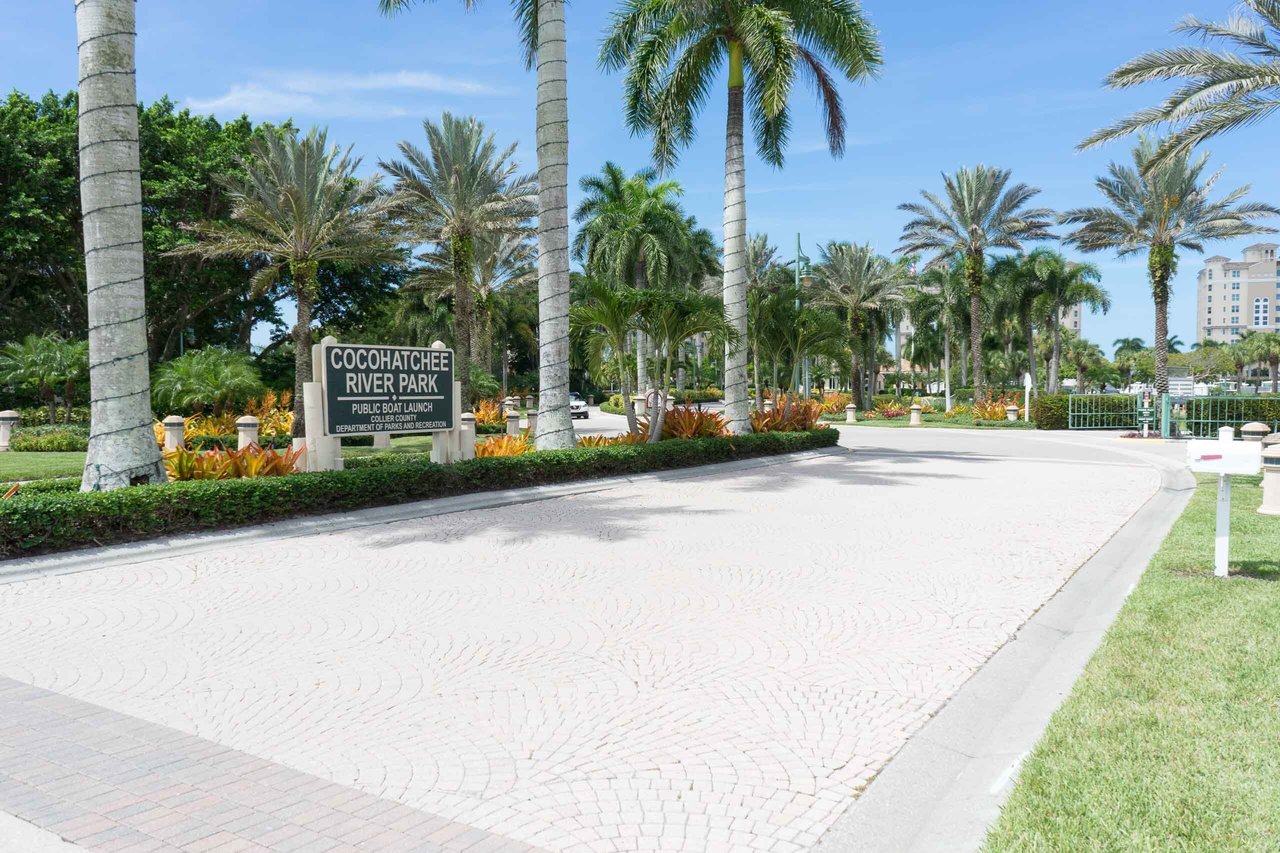 Cocohatchee river park entrance sign
