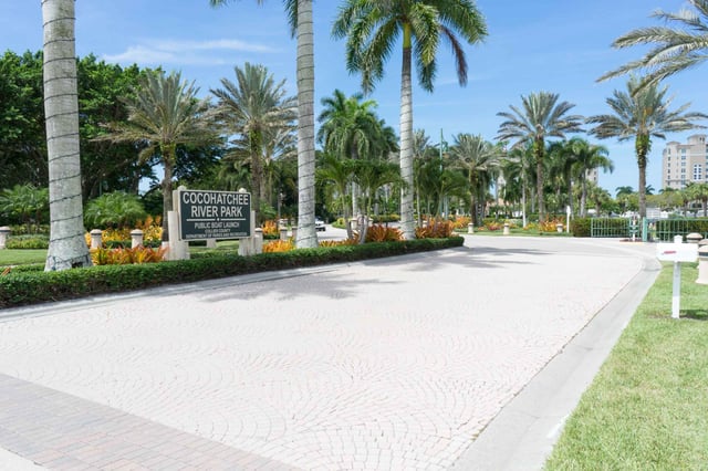 Cocohatchee river park entrance sign