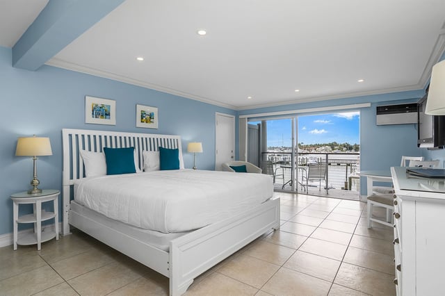 Cove inn naples bay florida room with large bed