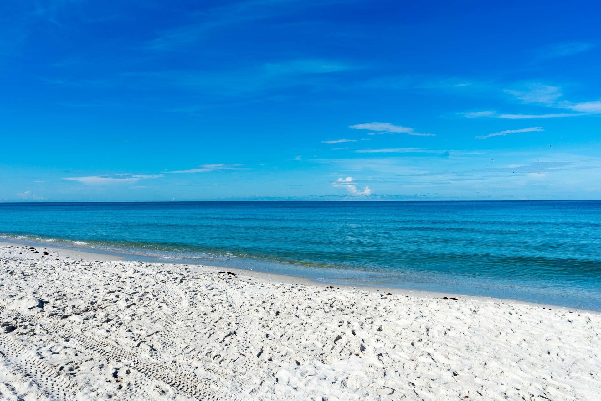 Turquoise Gulf water on the white sand at Delnor-Wiggins Pass State Park