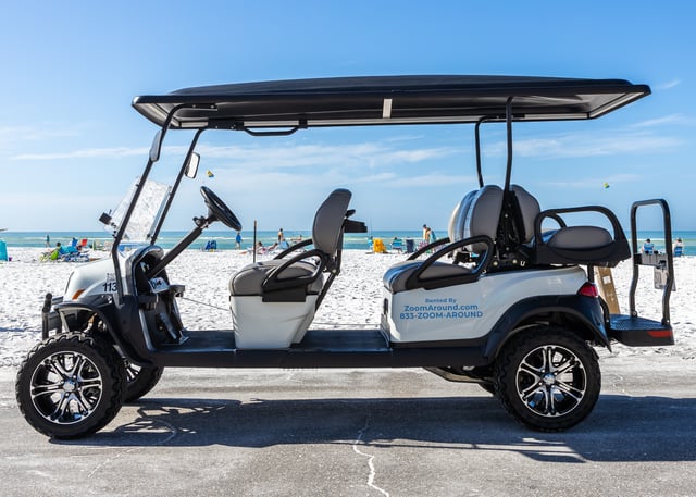 Zoom around golf cart rental side