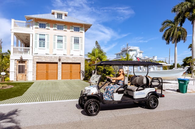 Zoom Around Happy Golf Cart Rental Customer