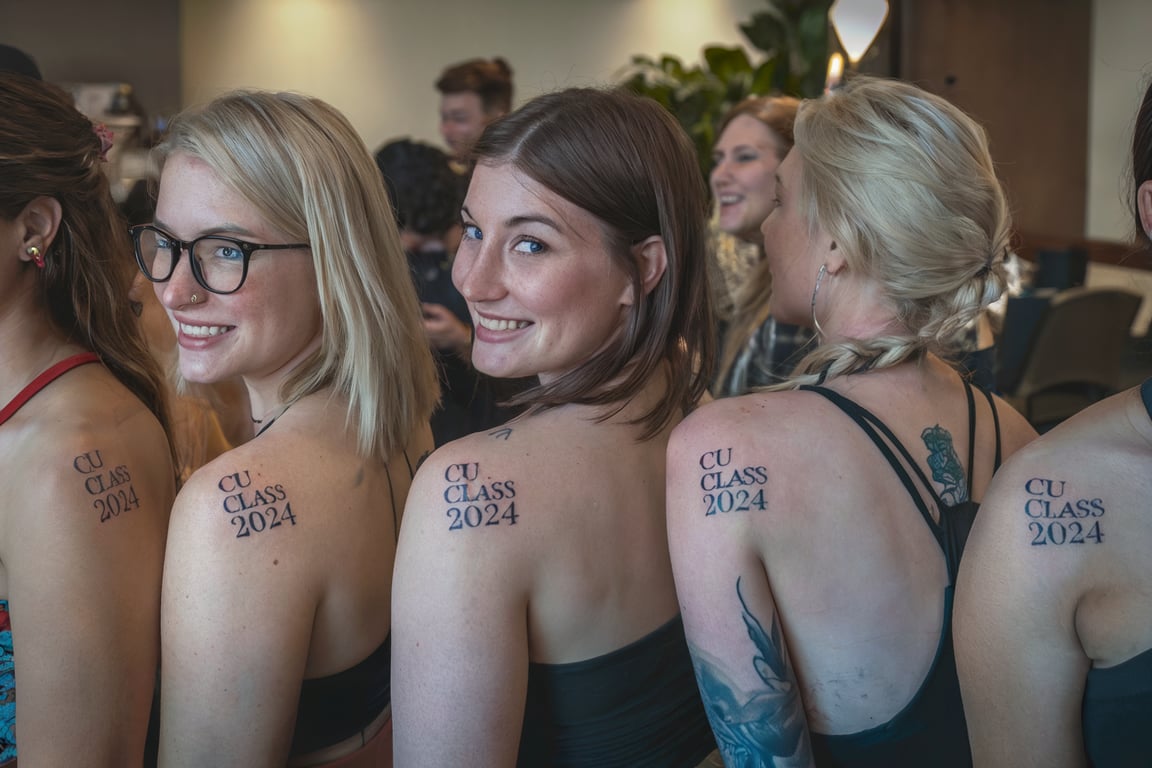 Group celebrating graduation with tattoos