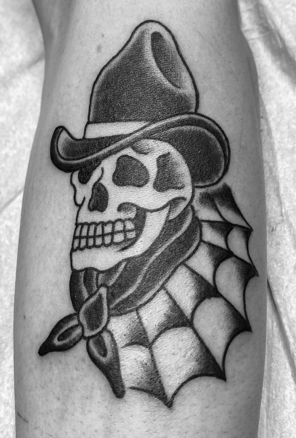 Dead Cowboy Under a Black Hat