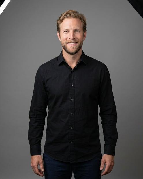 Neutral Mid-Grey Gradient Seamless · Black Button-Up with Dark Trousers headshot example