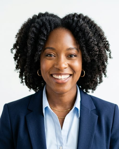 White / Pure White Studio · Navy blazer with light blue shirt headshot example