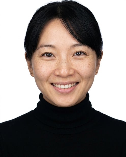 White / Pure White Studio · Fitted black turtleneck headshot example