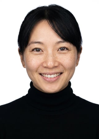 Professional AI LinkedIn headshot in Fitted black turtleneck on White / Pure White Studio