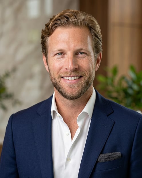 Clean White Studio · Open-Collar Blazer headshot example