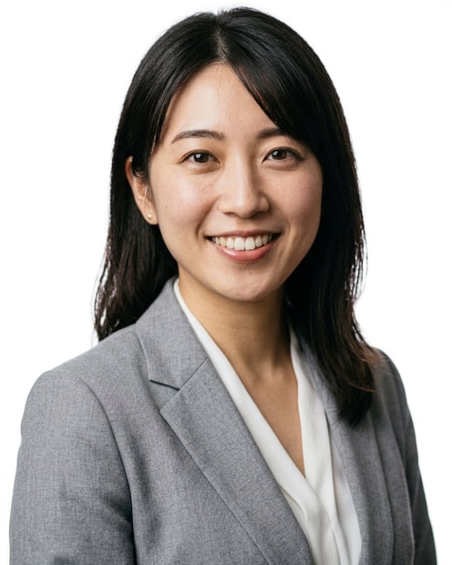 White / Pure White Studio · Light gray blazer headshot example