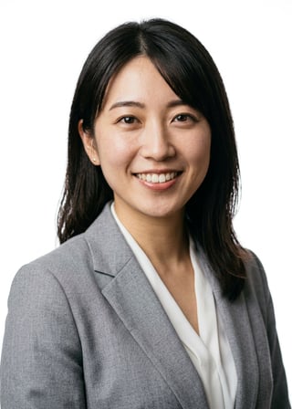 Professional AI LinkedIn headshot in Light gray blazer (soft pink variant for women) on White / Pure White Studio