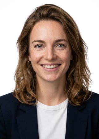 Professional AI LinkedIn headshot in Open navy blazer over simple white tee (tech-casual) on White / Pure White Studio