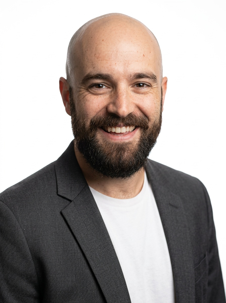 Professional AI LinkedIn headshot in Charcoal gray open blazer over white tee on White / Pure White Studio