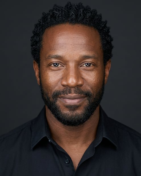 Dark Charcoal Grey Gradient · Black Button-Up with Dark Trousers headshot example