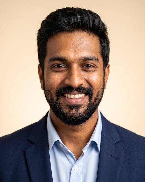 Warm Studio · Navy Blazer headshot example