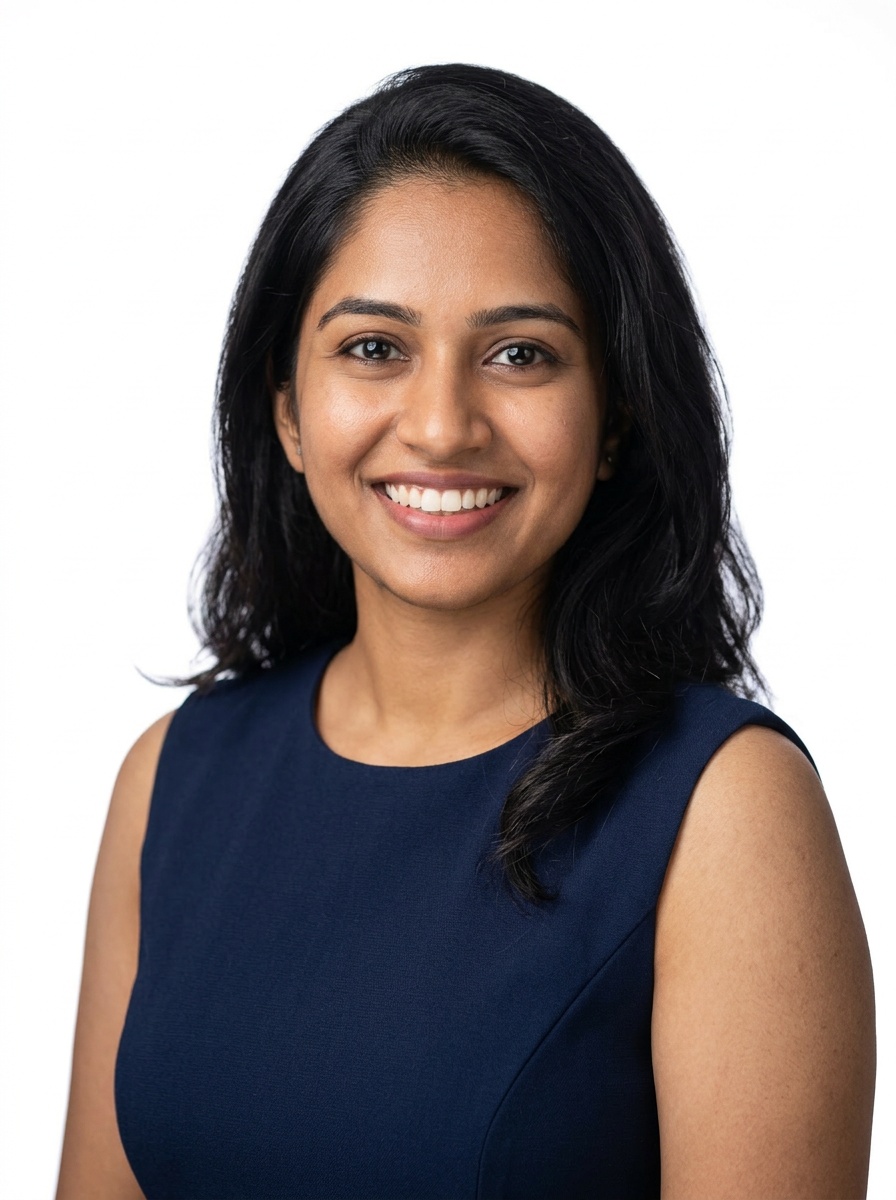 Professional AI LinkedIn headshot in Navy blue sleeveless dress on White / Pure White Studio