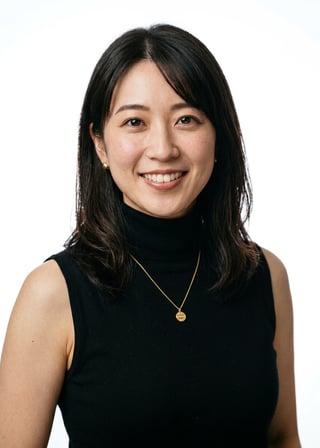 Professional AI LinkedIn headshot in Black sleeveless turtleneck on White / Pure White Studio