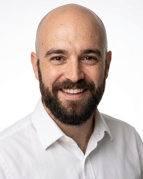 White / Pure White Studio · White button-up shirt headshot example