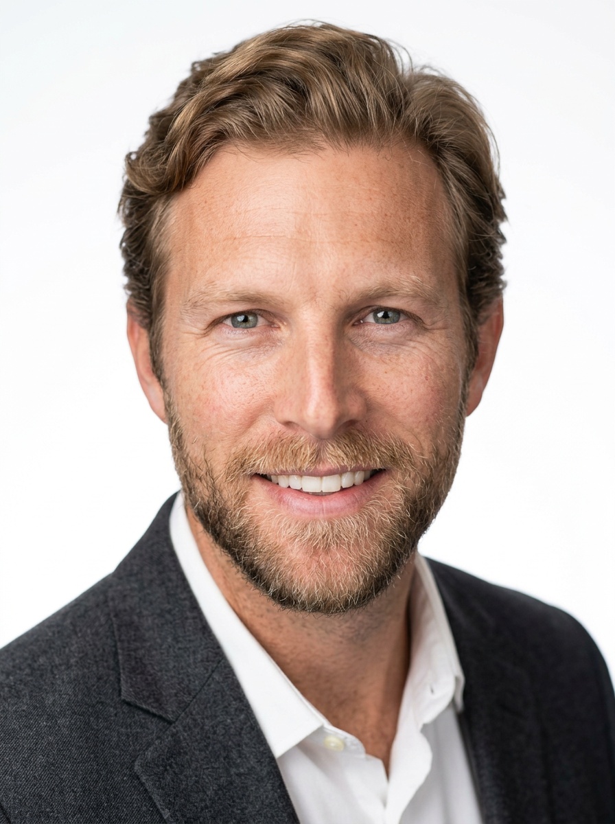 Professional AI LinkedIn headshot in Charcoal gray blazer on White / Pure White Studio