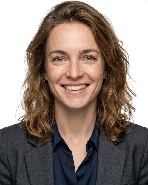 White / Pure White Studio · Charcoal gray blazer headshot example