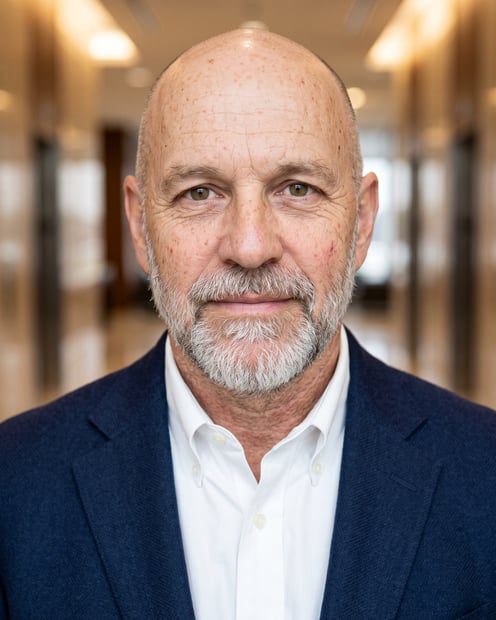 Corporate Lobby · Navy Blazer headshot example