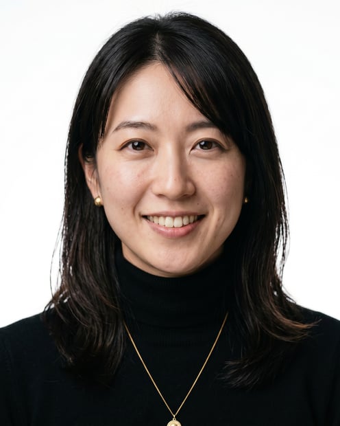 White / Pure White Studio · Fitted black turtleneck headshot example