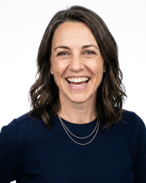 White / Pure White Studio · Navy blue crew-neck sweater headshot example