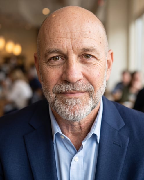 Warm Cafe · Navy Blazer headshot example