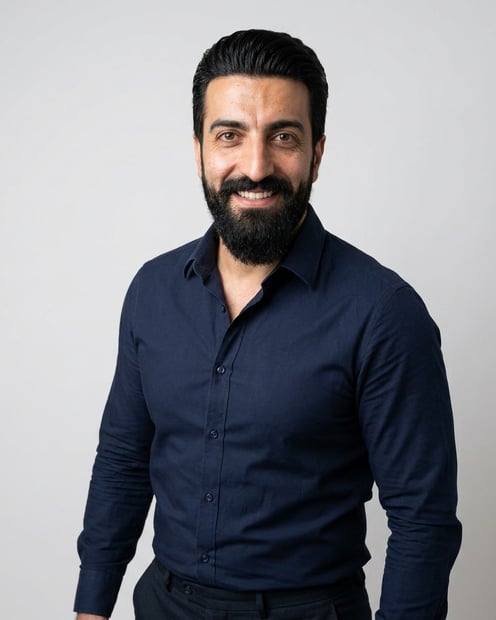 Soft White to Light Grey Studio · Navy Button-Up with Dark Trousers headshot example