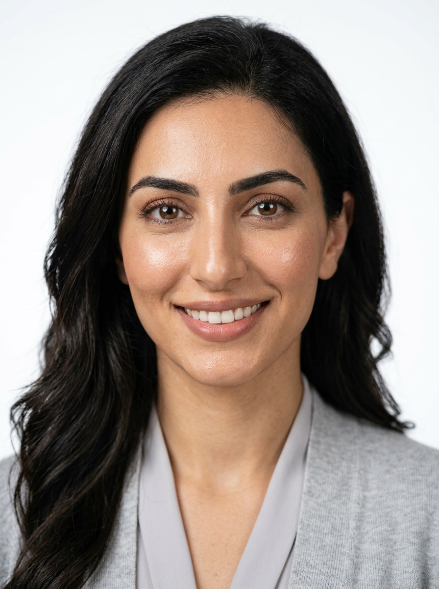 Professional AI LinkedIn headshot in Light gray cardigan on White / Pure White Studio
