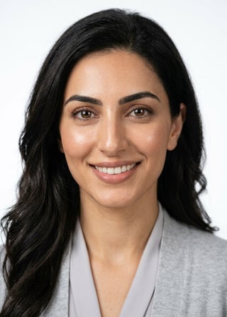 Professional AI LinkedIn headshot in Light gray cardigan on White / Pure White Studio