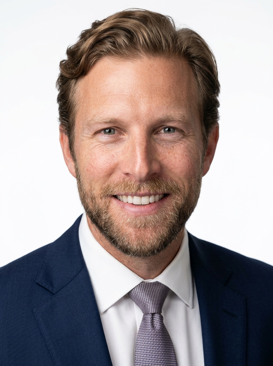 Professional AI LinkedIn headshot in Navy tailored suit on White / Pure White Studio