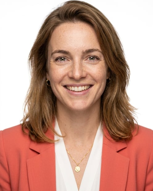 White / Pure White Studio · Coral blazer over white blouse headshot example