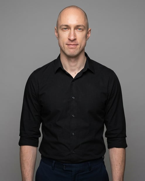 Neutral Grey · Black Button-Up headshot example