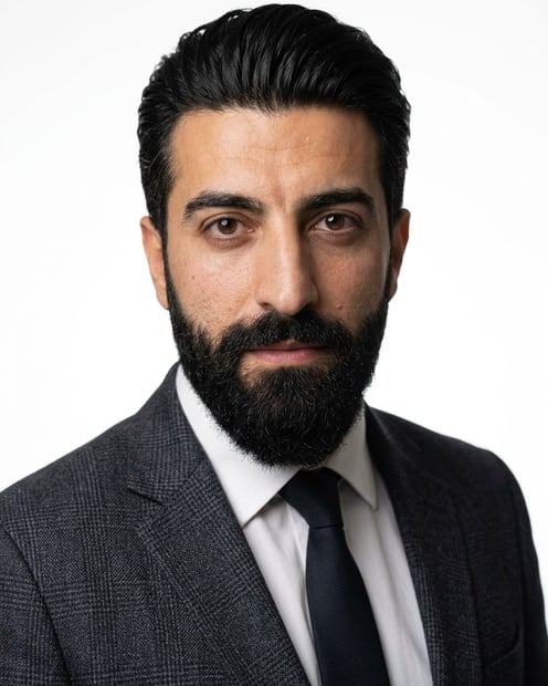 White / Pure White Studio · Dark gray patterned blazer headshot example